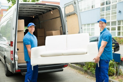 Professional piano removals in Battersea with careful lifting equipment