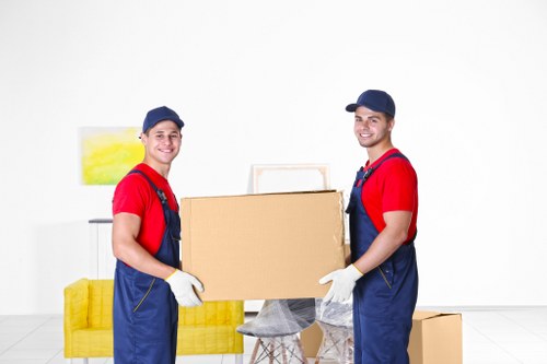 Team preparing a van with secure moving equipment