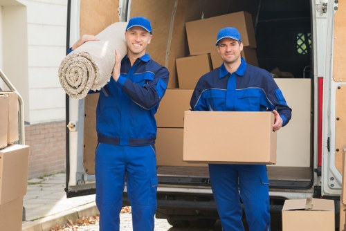Worker wearing PPE during a property move