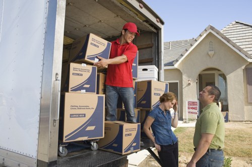 Commercial office movers handling equipment and furniture during a Battersea relocation