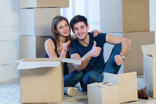 Secure furniture removals in Battersea showing careful handling of sofas and cabinets