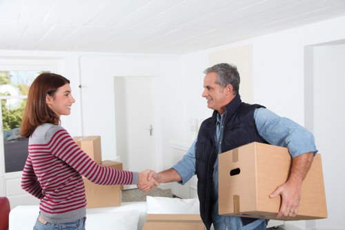 Professional man with van service navigating a Battersea residential move