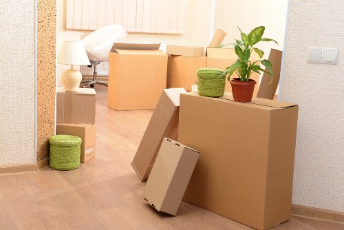 Professional movers handling furniture in Battersea